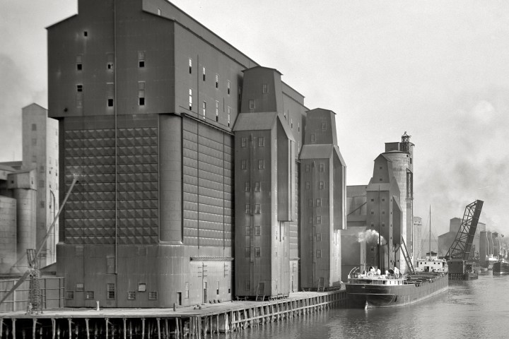 a vintage photo of a bridge over a body of water